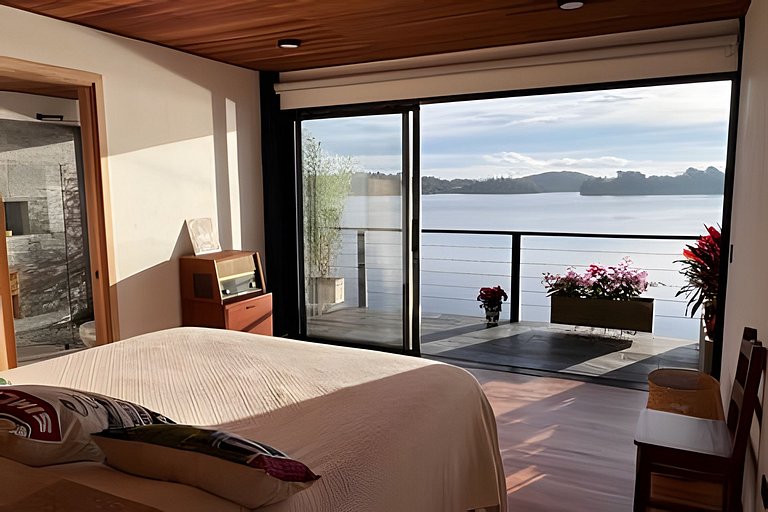 Villa frente a la represa vista a piedra del peñol