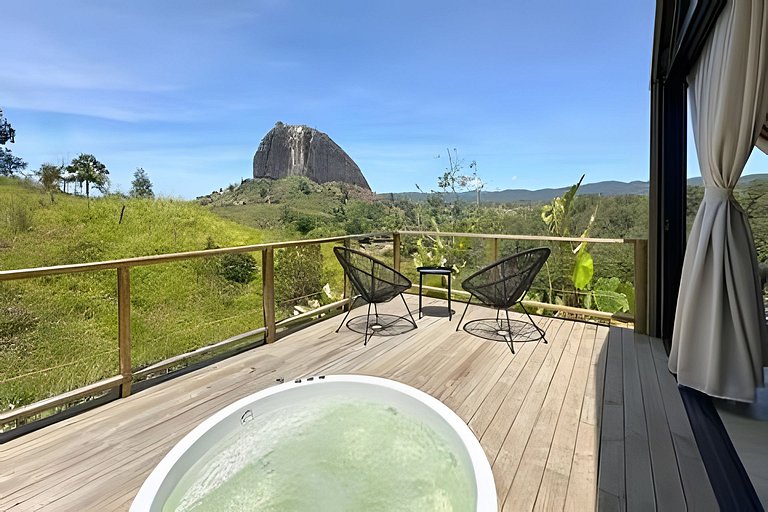 Cabaña romantica con jacuzzi frente a la represa
